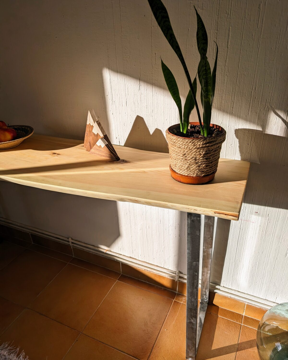 Console table with metal legs and live edge