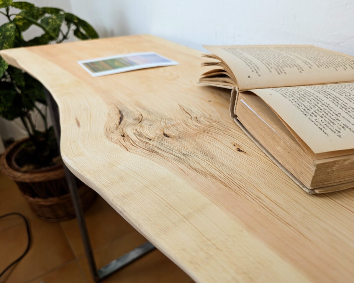 Console table with metal legs and live edge