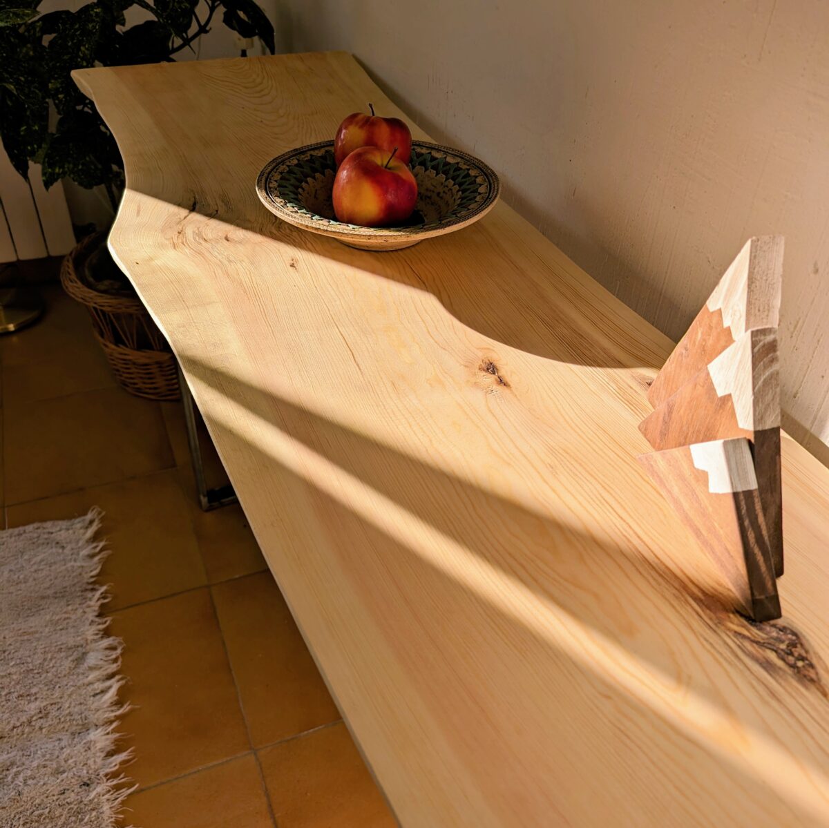 Console table with metal legs and live edge