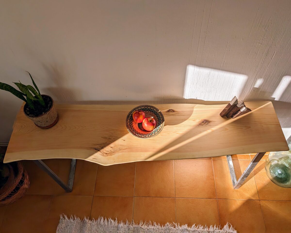 Console table with metal legs and live edge