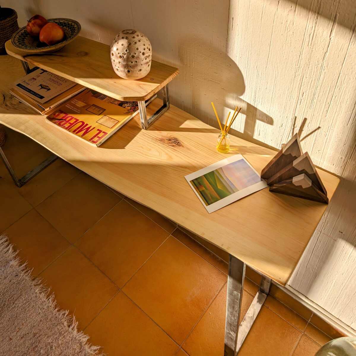 Console table with metal legs and live edge